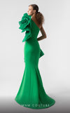 MNM Couture G1918 emerald green mermaid gown with bold one-sleeve ruffle detailing. | Couture Shop LA