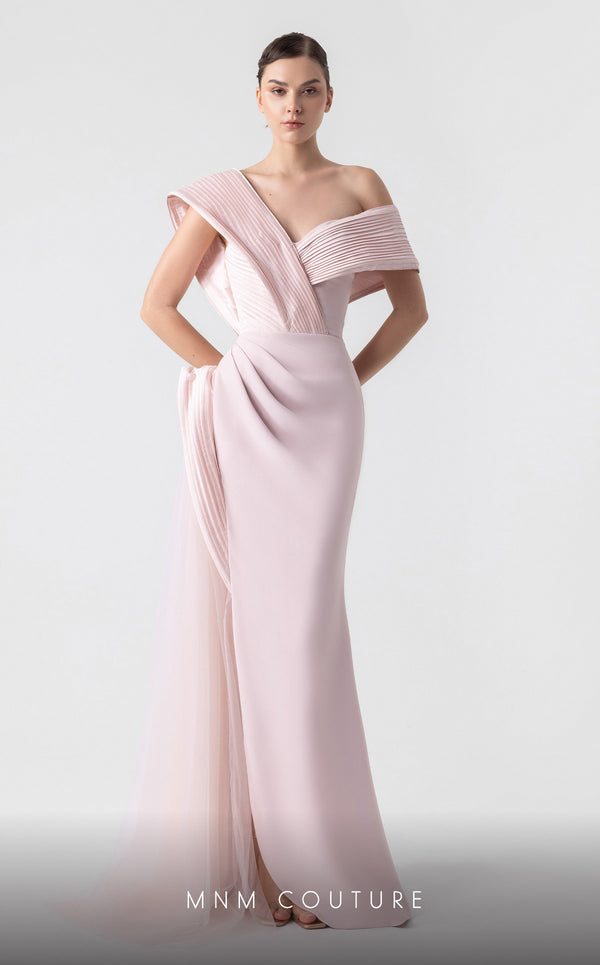 MNM Couture G1929 pink gown with asymmetrical pleats and flowing fabric for an elegant and timeless look. | Couture Shop LA