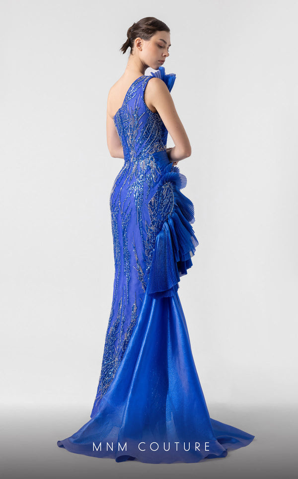 MNM Couture G1933 royal blue evening gown with cascading pleats and silver lace detailing. | Couture Shop LA