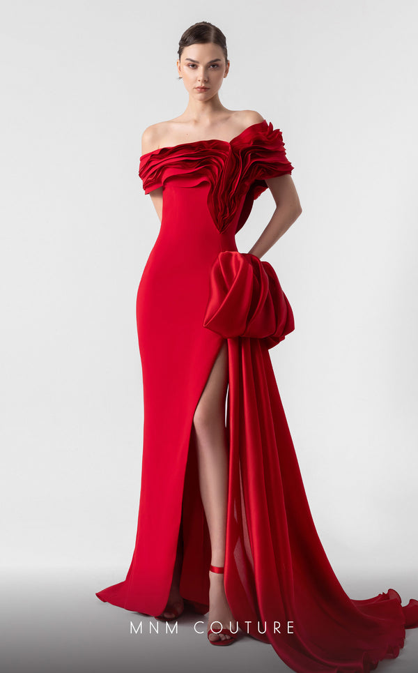 MNM Couture G1942 scarlet red gown with off-shoulder elegance and a bold organza side train. | Couture Shop LA