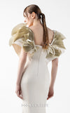 MNM Couture Style G2005 showcasing a cream mermaid gown with architectural golden pleated organza shoulder detailing resembling sculptural wings and ethereal fan accents | Couture Shop LA