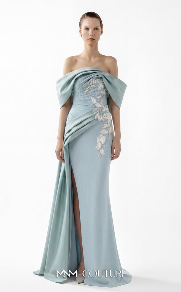 MNM Couture Style G2007 showcasing a cream crepe gown with dramatic off-shoulder satin sleeves, exquisite handmade embroidery on the bodice, and subtle thigh-high slit | Couture Shop LA