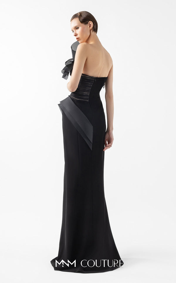 MNM Couture Style G2010 showcasing a black crepe gown with a sculpted bust of organza, Chantilly lace, draped tulle, and a daring high front slit. | Couture Shop LA