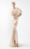MNM Couture Style G2013 showcasing a cream crepe gown with voluminous cascading peach organza ruffles and a sculpted high front slit framed by fluid folds | Couture Shop LA
