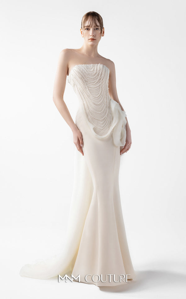 MNM Couture Style G2015 showcasing a cream strapless mermaid gown with pearl lace bodice detailing and sculptural organza inserts blooming at the hip | Couture Shop LA