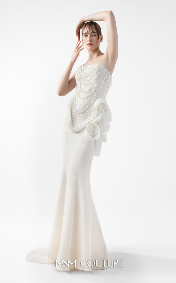 MNM Couture Style G2015 showcasing a cream strapless mermaid gown with pearl lace bodice detailing and sculptural organza inserts blooming at the hip | Couture Shop LA