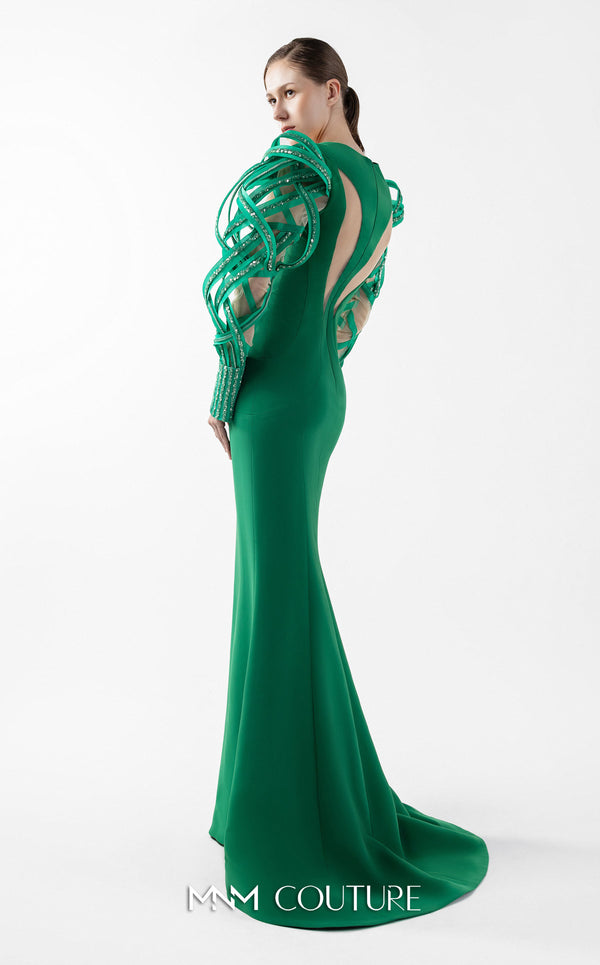 MNM Couture Style G2017 showcasing an emerald green crepe mermaid gown with mesmerizing illusion sleeves featuring intricate lace and ethereal organza inserts