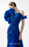 MNM Couture Style G2019 showcasing a royal blue strapless gown with sculptural taffeta draping cascading from bustline to hem, featuring architectural design and dramatic side train | Couture Shop LA