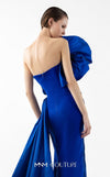 MNM Couture Style G2019 showcasing a royal blue strapless gown with sculptural taffeta draping cascading from bustline to hem, featuring architectural design and dramatic side train | Couture Shop LA
