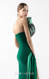 MNM Couture Style G2023 emerald green evening dress with column-fitted silhouette, asymmetric neckline, side slit, and cascading train, exuding luxury | Couture Shop LA
