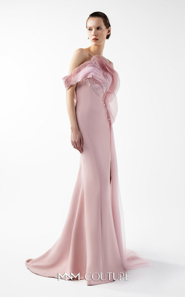 MNM Couture Style G2031 showcasing a pink mermaid gown with an embellished off-shoulder, intricate lace detailing, an alluring open slit, and a delicate tulle train | Couture Shop LA