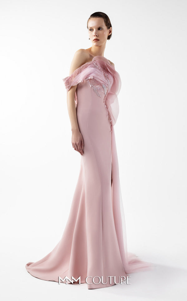 MNM Couture Style G2031 showcasing a pink mermaid gown with an embellished off-shoulder, intricate lace detailing, an alluring open slit, and a delicate tulle train | Couture Shop LA