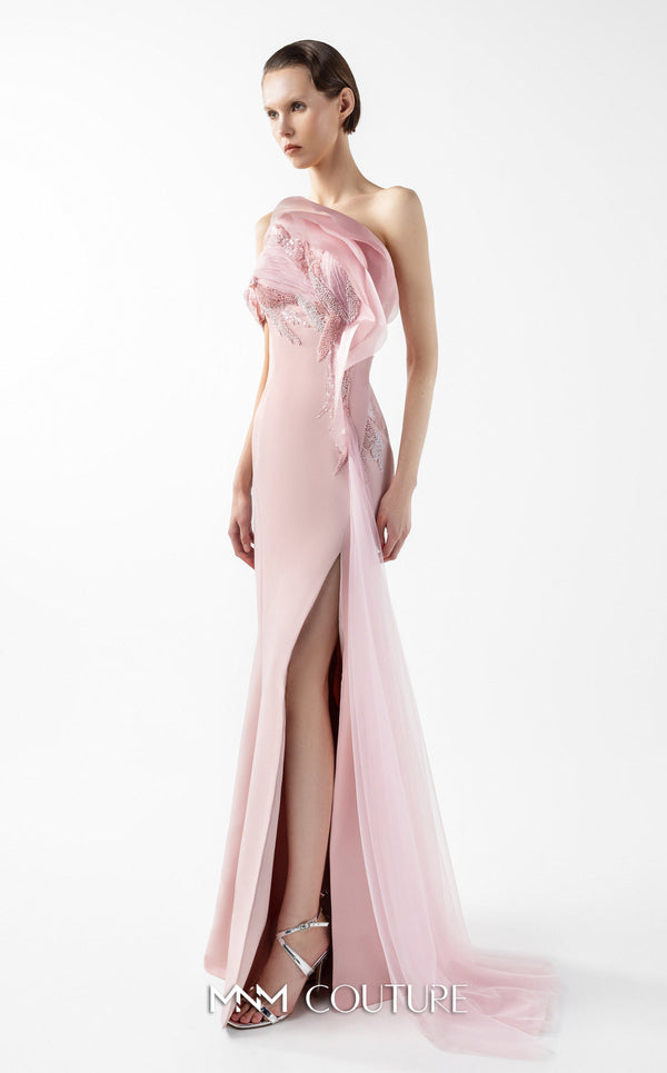 MNM Couture Style G2031 showcasing a pink mermaid gown with an embellished off-shoulder, intricate lace detailing, an alluring open slit, and a delicate tulle train | Couture Shop LA