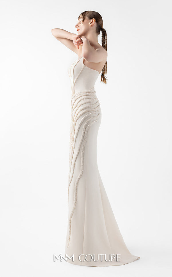 MNM Couture Style G2032 showcasing a cream mermaid gown with three-angular corseted neckline, fitted silhouette, and intricate ribbed lace textural detailing throughout the skirt | Couture Shop LA