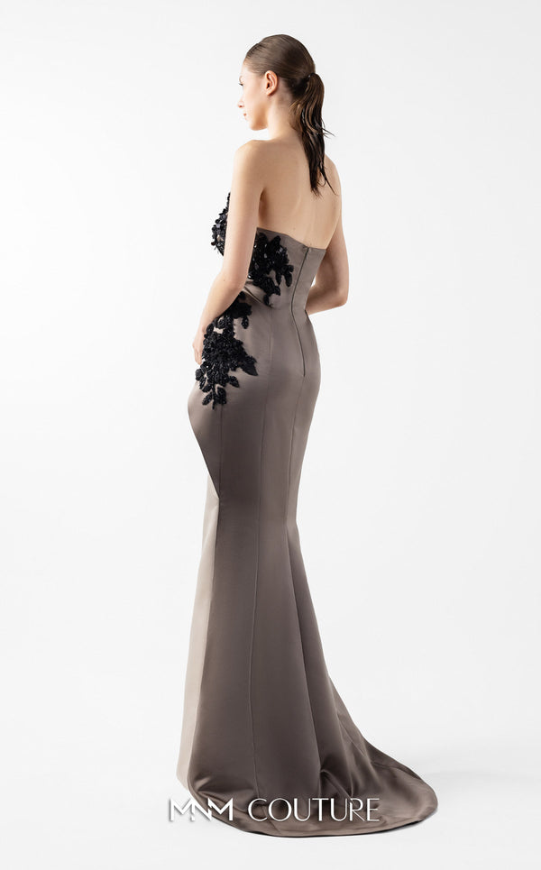 MNM Couture Style G2045 showcasing a strapless dual-tone gown in cream and anthracite, featuring a sculpted hip design and floral appliqué on the bodice. | Couture Shop LA