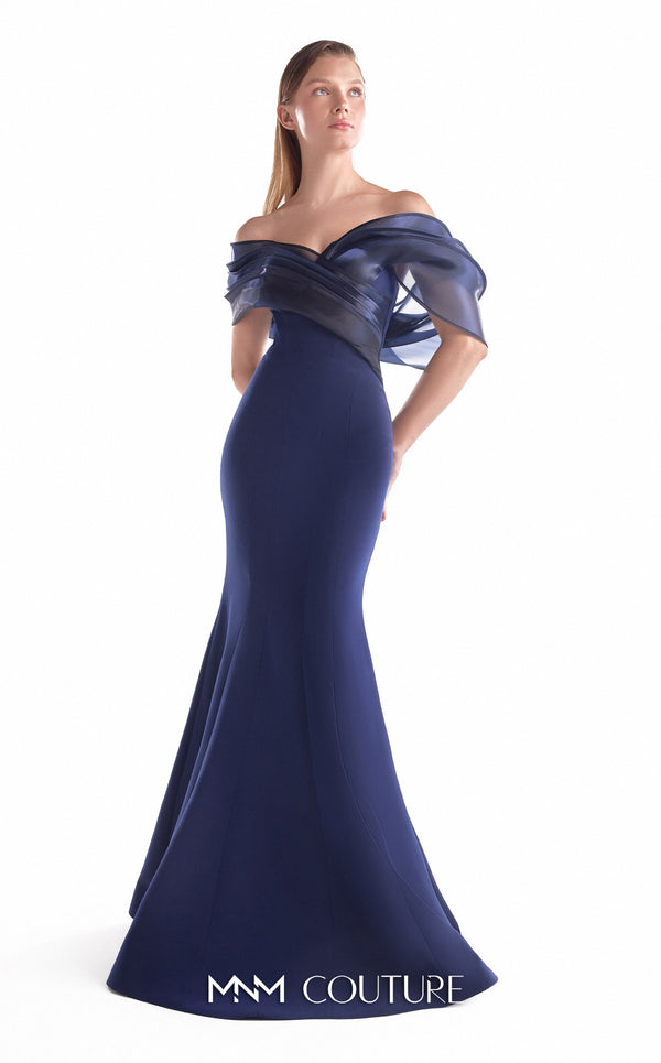 Navy crepe mermaid gown MNM Couture Style G2144 featuring an off-shoulder neckline with gracefully draped midnight blue liquid organza
