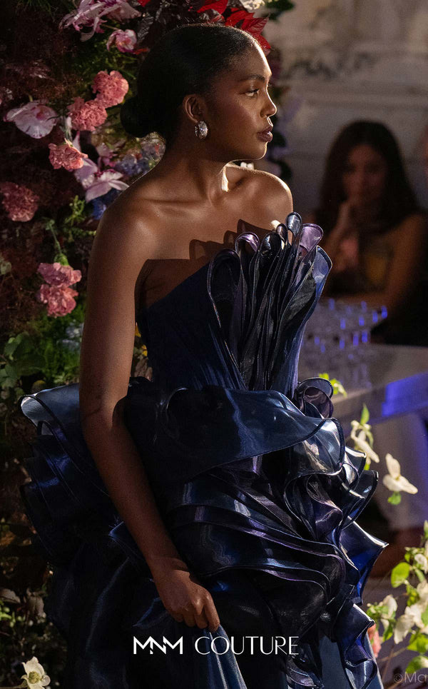 Strapless evening gown MNM Couture Style G2146 with cascading purple and navy fluid organza and a 3D floral waist bloom