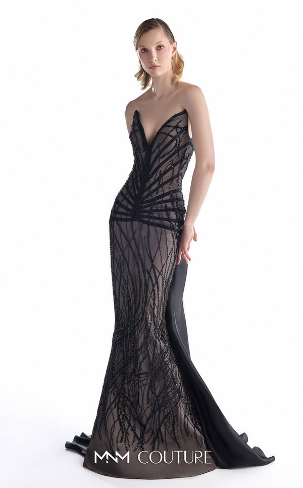 MNM Couture G2200 black sheer lace column gown with pointed sweetheart neckline, strapless corset, hand-beaded geometric embroidery, low V-back, and detachable organza overskirt with cathedral train | Couture Shop LA.