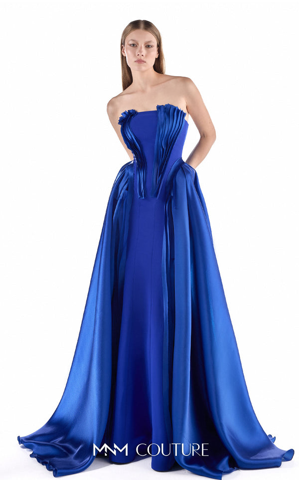 MNM Couture G2225 sapphire crepe and satin organza strapless straight column gown with sculptural pleated satin organza bodice and detachable overskirt with floor-length train | Couture Shop LA.