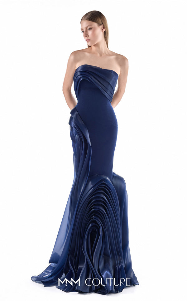 MNM Couture G2230 navy crepe and liquid organza strapless slim mermaid gown with sculptural wave-inspired draping and flowing organza train | Couture Shop LA.