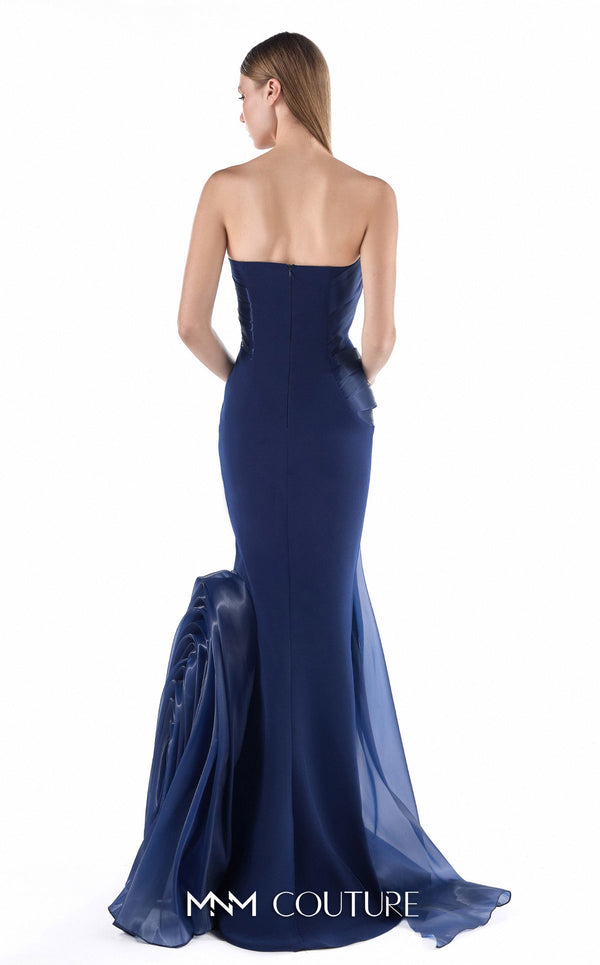 MNM Couture G2230 navy crepe and liquid organza strapless slim mermaid gown with sculptural wave-inspired draping and flowing organza train | Couture Shop LA.