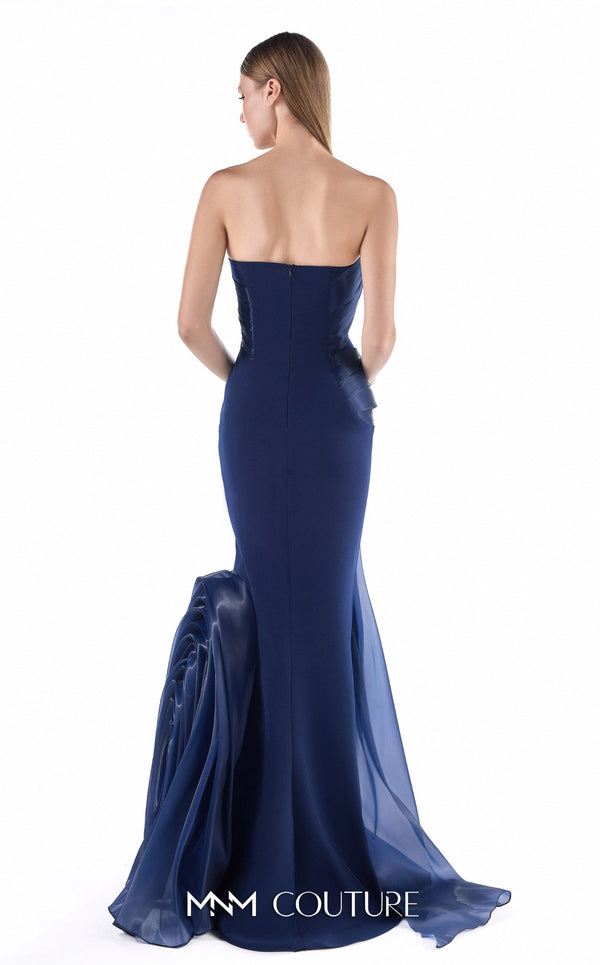 MNM Couture G2230 navy crepe and liquid organza strapless slim mermaid gown with sculptural wave-inspired draping and flowing organza train | Couture Shop LA.