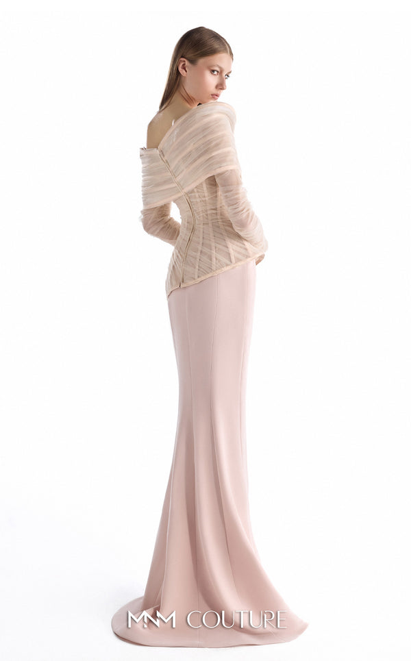 MNM Couture G2249 blush crepe and tulle off-the-shoulder column gown with sculpted corset bodice, layered tulle draping, asymmetrical peplum, sheer fitted long sleeves, and soft train | Couture Shop LA.
