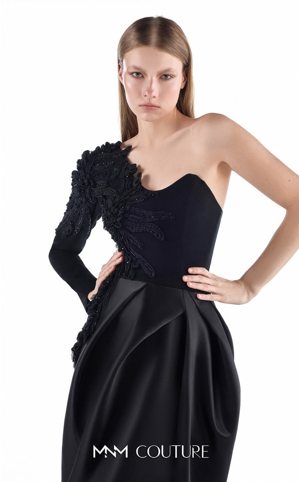 MNM Couture G2250 black crepe, mikado, and handmade embroidery one-shoulder column gown with embroidered single sleeve, sculptural mikado draped skirt, and thigh-high slit | Couture Shop LA.