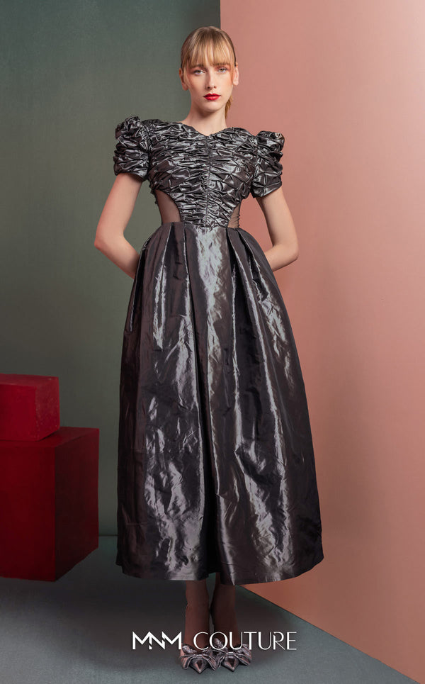 MNM Couture GOF2512 dress in anthracite taffeta, featuring a ruched bodice, voluminous puff sleeves, an A-line midi skirt, and transparent mesh side panels. | Couture Shop LA