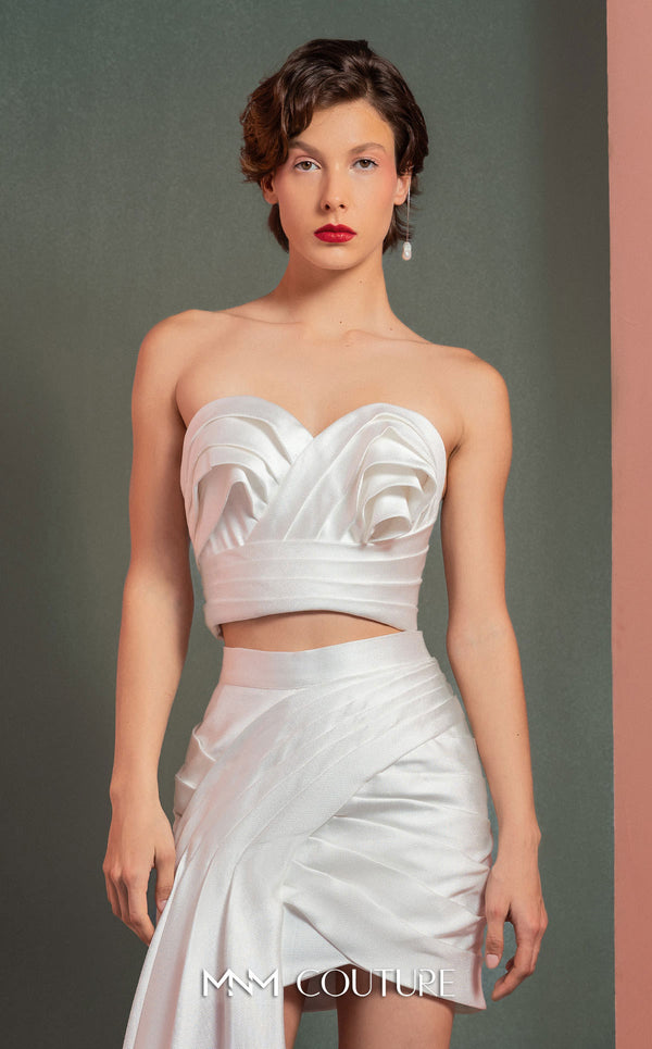 MNM Couture GOF2515 two-piece ensemble in white mikado piqué, featuring a strapless top with draped detailing and a matching high-waisted asymmetrical skirt with a cascading drape. | Couture Shop LA