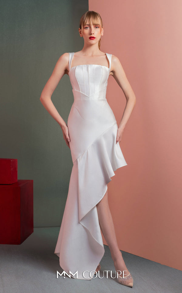 MNM Couture GOF2517 dress in white mikado piqué, featuring a structured bodice with thin straps and a gracefully flowing asymmetrical high-low skirt. | Couture Shop LA