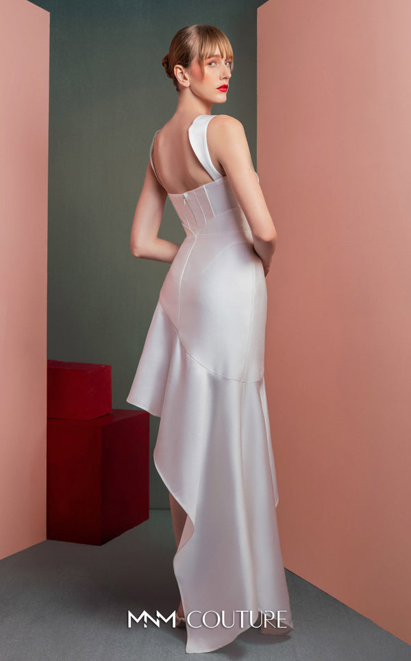 MNM Couture GOF2517 dress in white mikado piqué, featuring a structured bodice with thin straps and a gracefully flowing asymmetrical high-low skirt. | Couture Shop LA