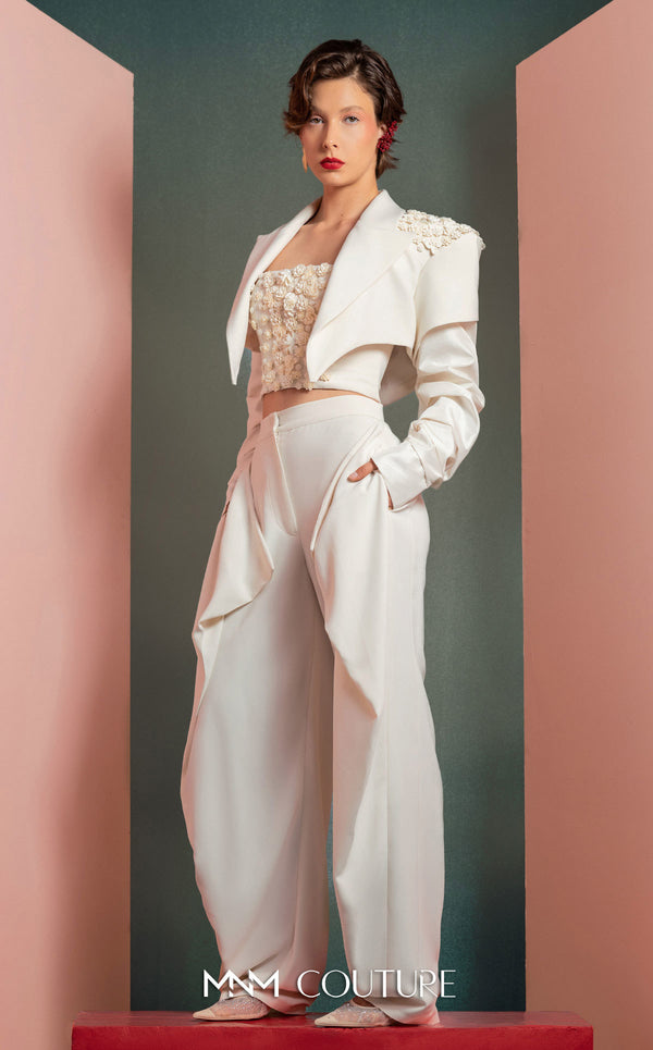 MNM Couture GOF2522 three-piece white ensemble, including wide-leg draped trousers, a floral corset top, and a cropped asymmetrical jacket with floral and ruched detailing. | Couture Shop LA