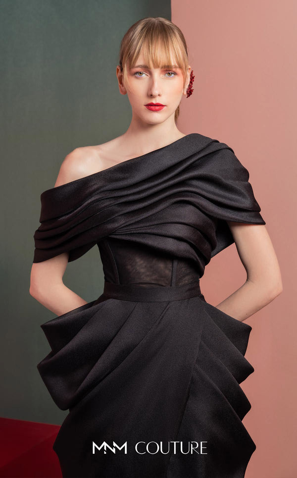 MNM Couture GOF2528 two-piece ensemble in black mikado piqué, featuring a sculpted skirt with intricate draping and a matching draped one-shoulder top. | Couture Shop LA