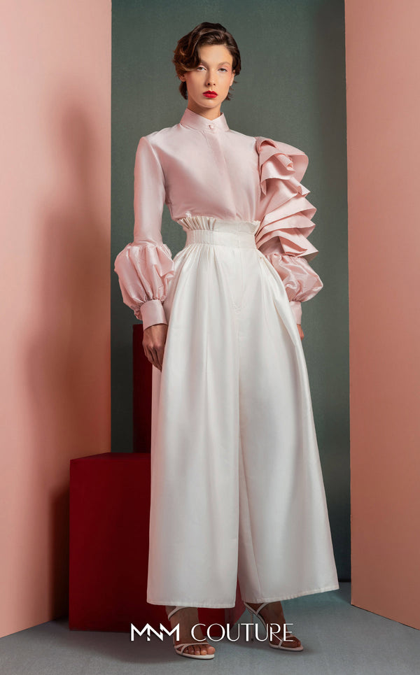MNM Couture GOF2529 two-piece ensemble, featuring high-waisted white taffeta wide-leg pants and a tailored soft pink blouse with intricate ruffled sleeves. | Couture Shop LA