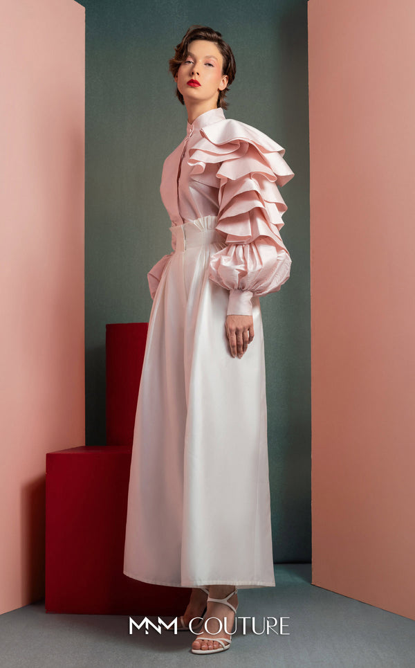 MNM Couture GOF2529 two-piece ensemble, featuring high-waisted white taffeta wide-leg pants and a tailored soft pink blouse with intricate ruffled sleeves. | Couture Shop LA