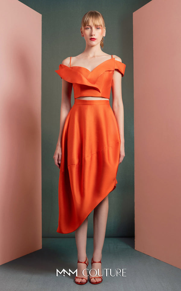 MNM Couture GOF2537 orange mikado piqué high-low skirt with elegant draping, paired with an off-the-shoulder ruffled cropped top. | Couture Shop LA