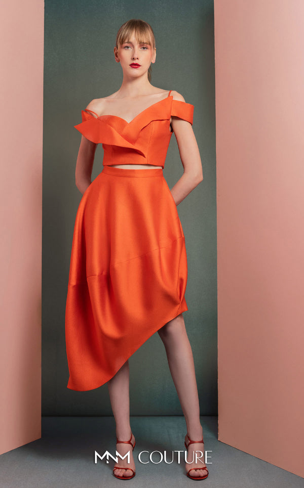 MNM Couture GOF2537 orange mikado piqué high-low skirt with elegant draping, paired with an off-the-shoulder ruffled cropped top. | Couture Shop LA