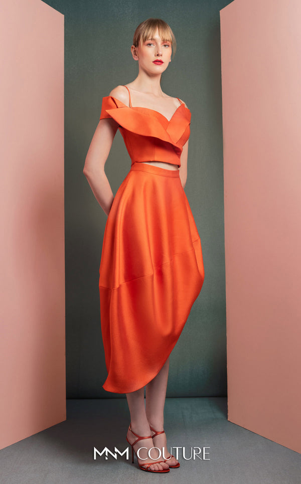 MNM Couture GOF2537 orange mikado piqué high-low skirt with elegant draping, paired with an off-the-shoulder ruffled cropped top. | Couture Shop LA