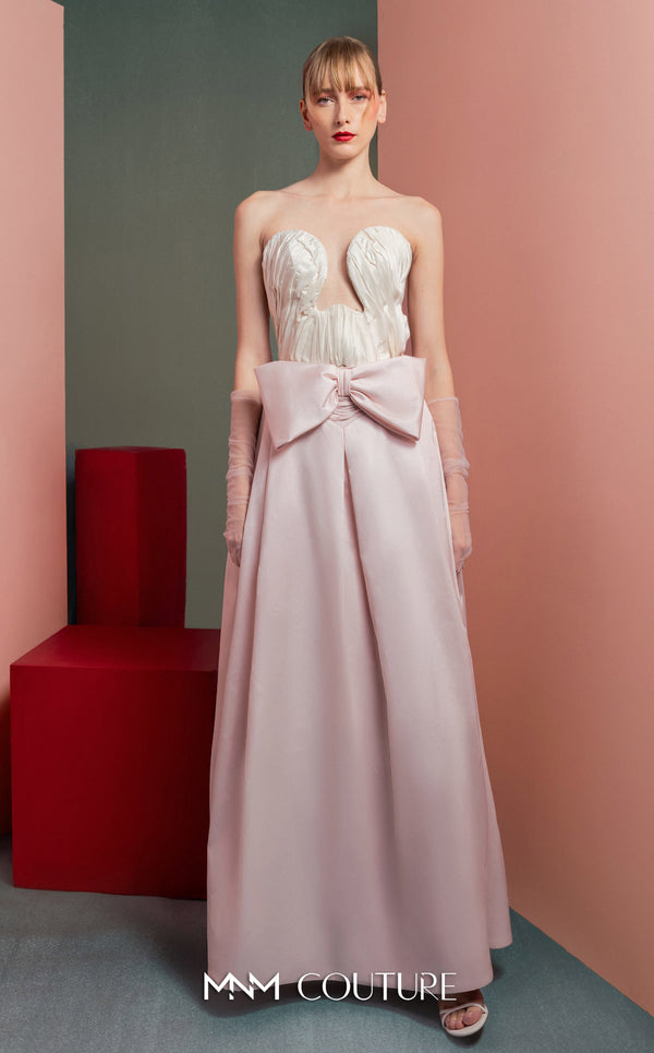 MNM Couture GOF2540 two-piece ensemble, featuring a structured white taffeta corset with draped detailing and a matching full-length taffeta skirt with a large bow accent at the waist. | Couture Shop LA