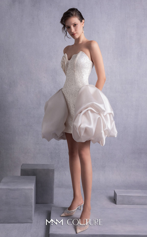 MNM Couture GOS2501 Gold champagne sequin mini dress with angular strapless bodice and puffy organza skirt overlay, perfect for glamorous occasions. | Couture Shop LA