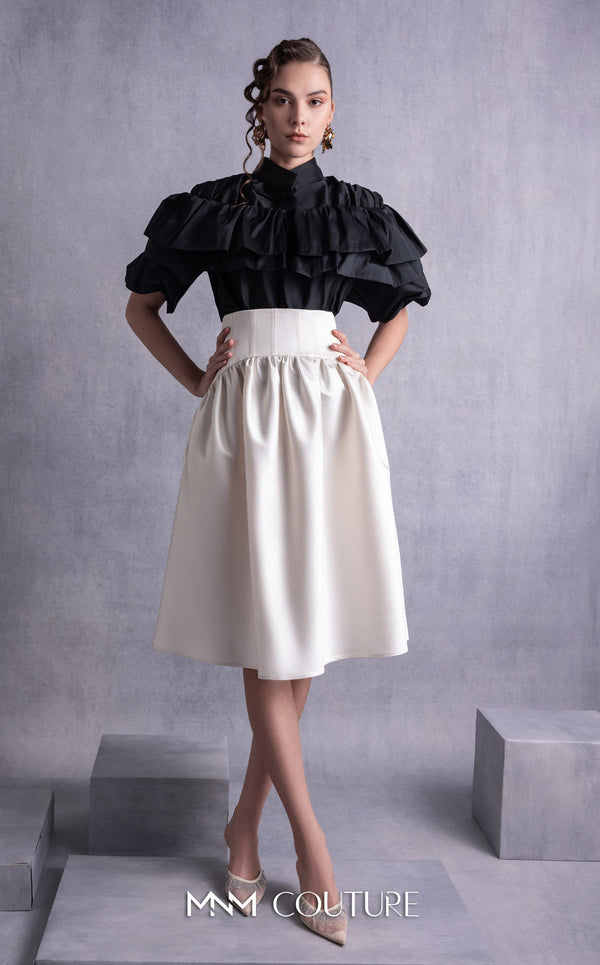 MNM Couture GOS2506 High-waisted gold champagne razmir skirt with gathered details and black taffeta top with cascading ruffles and a structured neckline. | Couture Shop LA