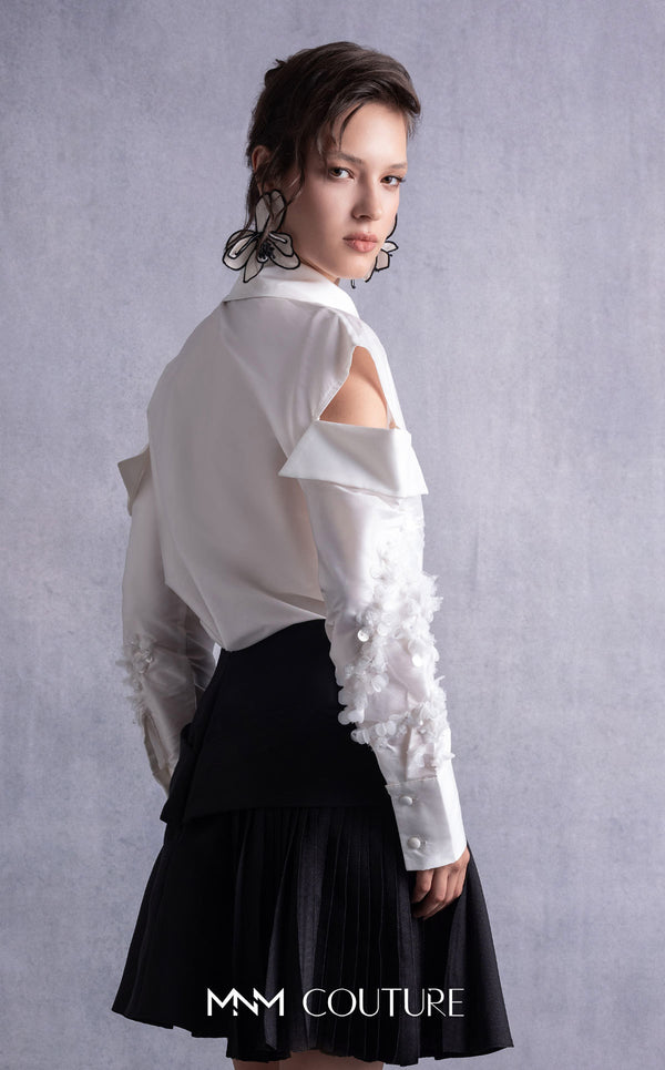 MNM Couture GOS2519 Black piqué skirt with bow design and off-white taffeta blouse with embroidered sleeves and cut-out shoulders. | Couture Shop LA