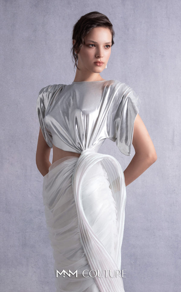 MNM Couture GOS2523 Silver lamé lycra dress with cutout design, side knot, draped tulle, and ribbed lamé organza accents. | Couture Shop LA