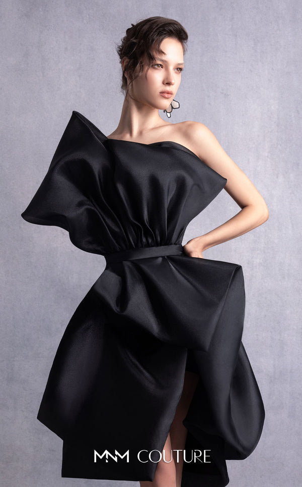 MNM Couture GOS2528 Black organza cocktail dress with asymmetric neckline, sculptural draping, and cinched waistline. | Couture Shop LA
