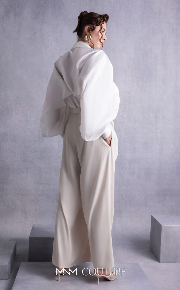 MNM Couture GOS2529 Nude crepe palazzo pants with wide legs and soft pink taffeta blouse with cascading ruffled sleeves. | Couture Shop LA