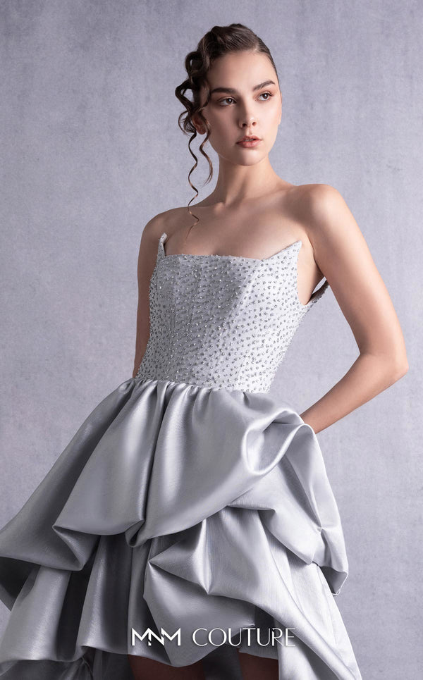 MNM Couture GOS2538 Silver mikado piqué strapless dress with angled bust design and layered ruffled skirt. | Couture Shop LA