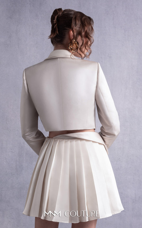 MNM Couture GOS2539 Pleated gold champagne razmir skirt with draped accents and cropped razmir jacket with tailored lapels. | Couture Shop LA