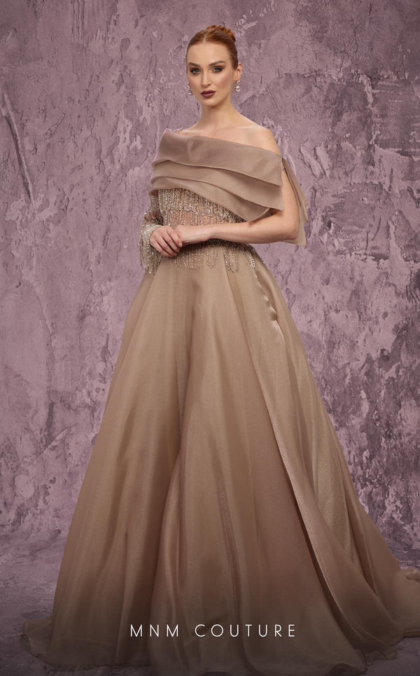 MNM Couture Style J03308 one-sleeved ballgown with beaded fringe, organza skirt, and asymmetrical neckline. \ Couture Shop LA