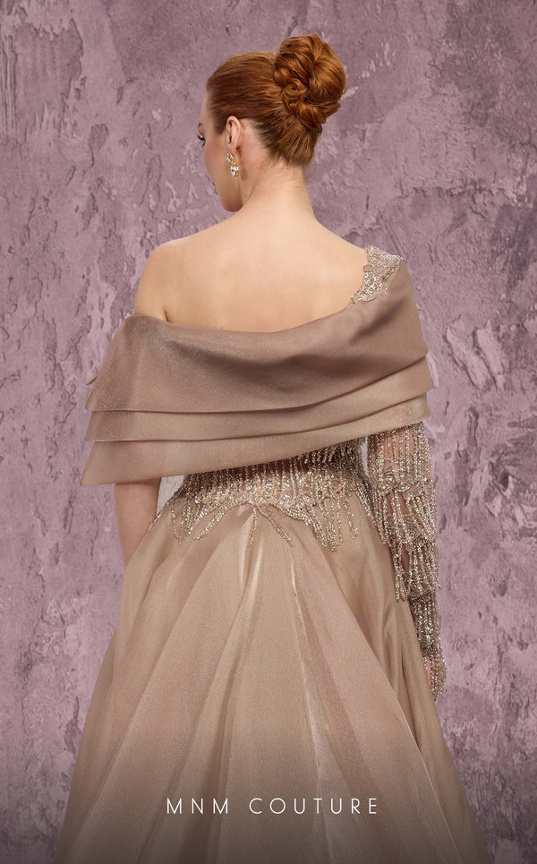 MNM Couture Style J03308 one-sleeved ballgown with beaded fringe, organza skirt, and asymmetrical neckline. \ Couture Shop LA